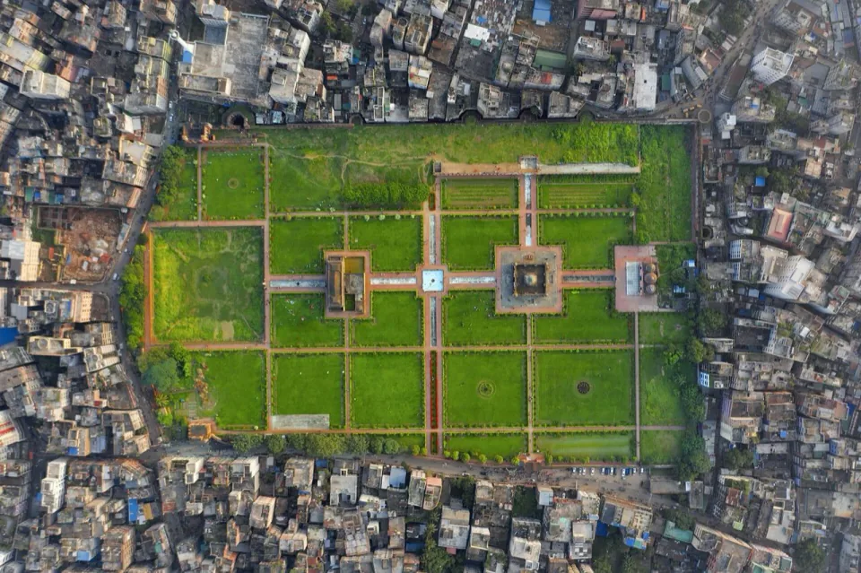 Top-down aerial view of Lalbagh Fort gardens surrounded by dense Old Dhaka buildings