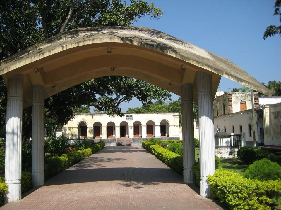 Arched gateway and garden path leading to Michael Madhusudan Dutt’s ancestral house at Sagardari